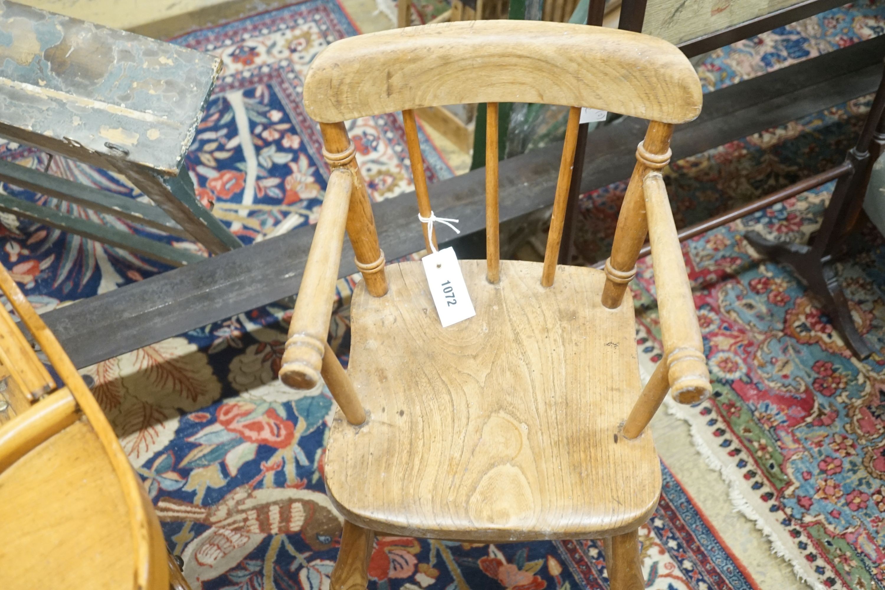 An early 20th century metamorphic child's high chair, together with a Victorian Windsor high chair